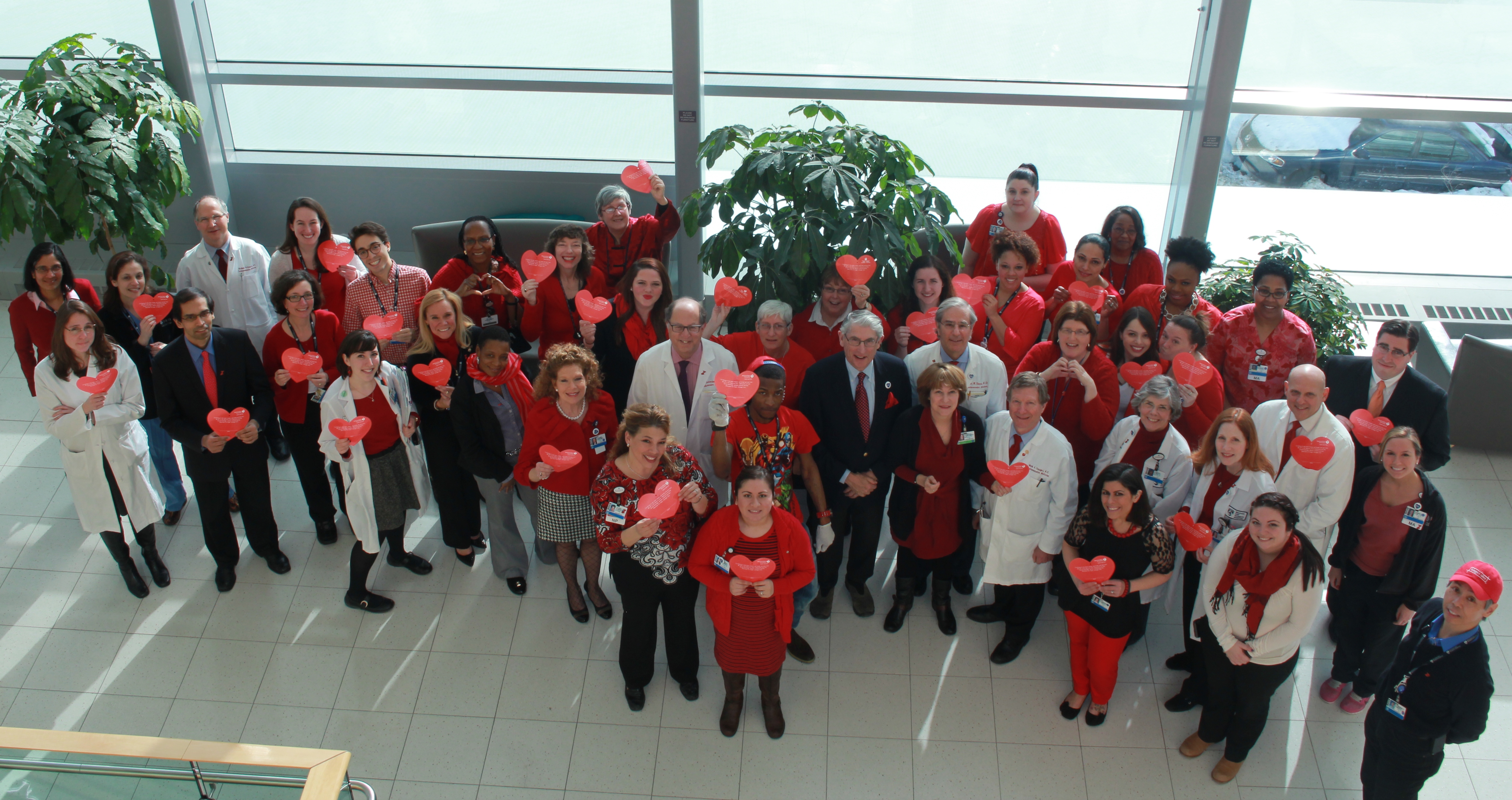 Members of the BWH Heart & Vascular Center pose for a group photo during National Wear Red Day.