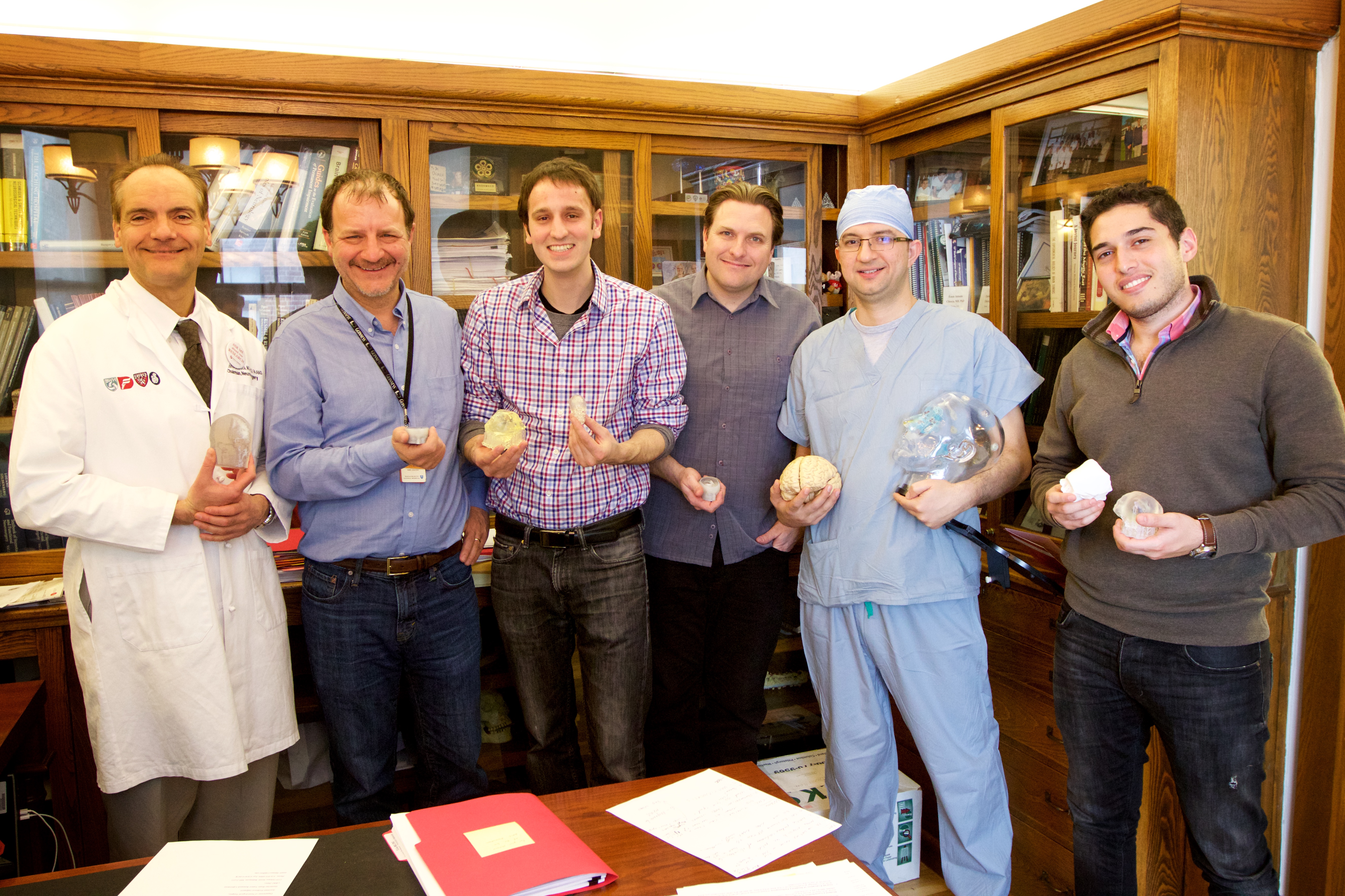 The team working on multimaterial biomedical 3-D printing, taken in Antonio Chiocca's office. From left: Chiocca, Steve Pieper, Steven Keating, James Weaver, of the Wyss Institute for Biologically Inspired Engineering at Harvard University, Mohamad Abolfotoh and Ahmed Hosny. 