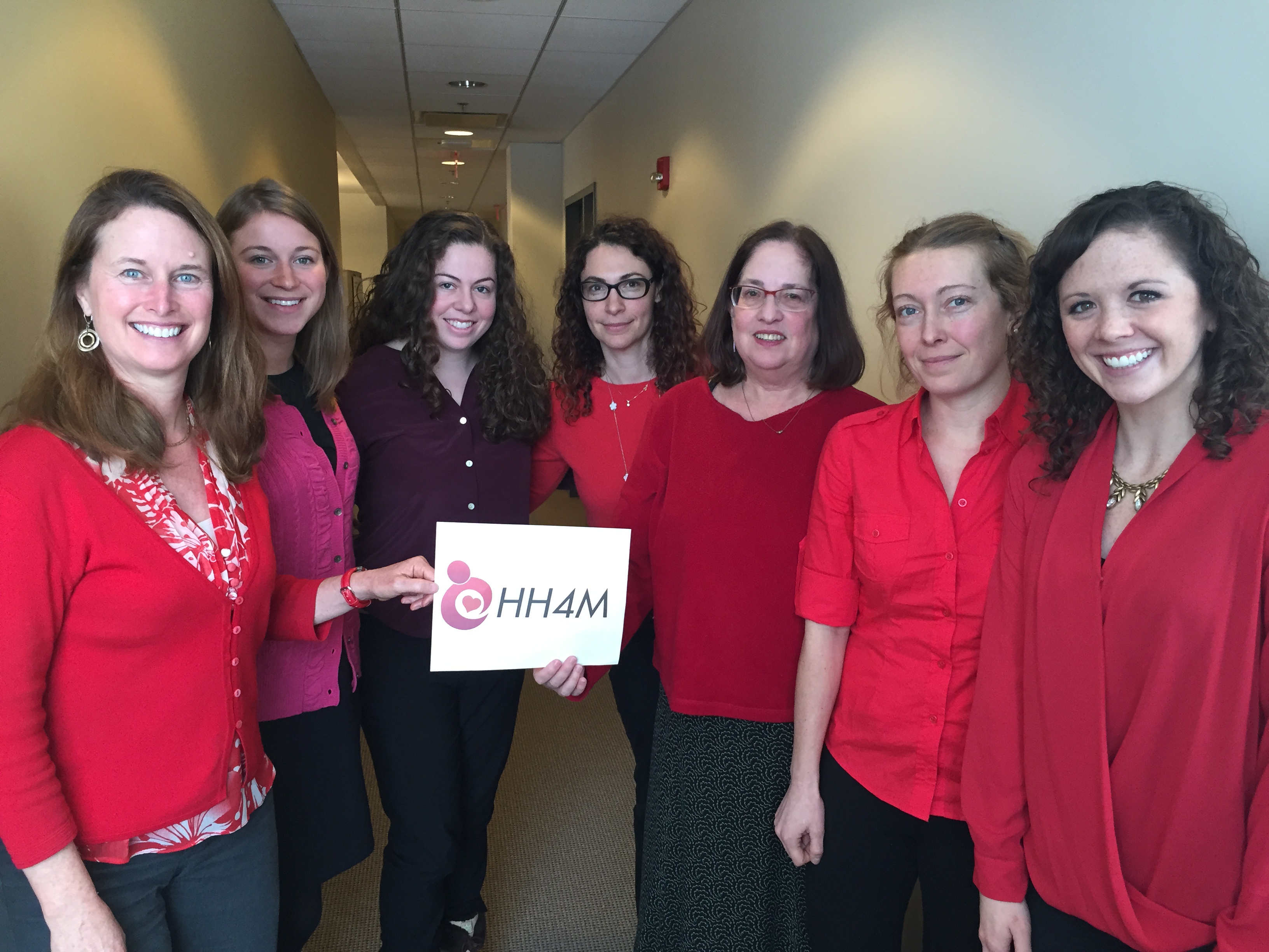 The Heart Health 4 Moms team, including Janet Rich-Edwards (far left) and Ellen Seely (third from right), wearing red to support heart health