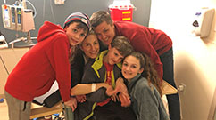 Tamara Barber (second from left) with her family on her final day of chemotherapy last December.