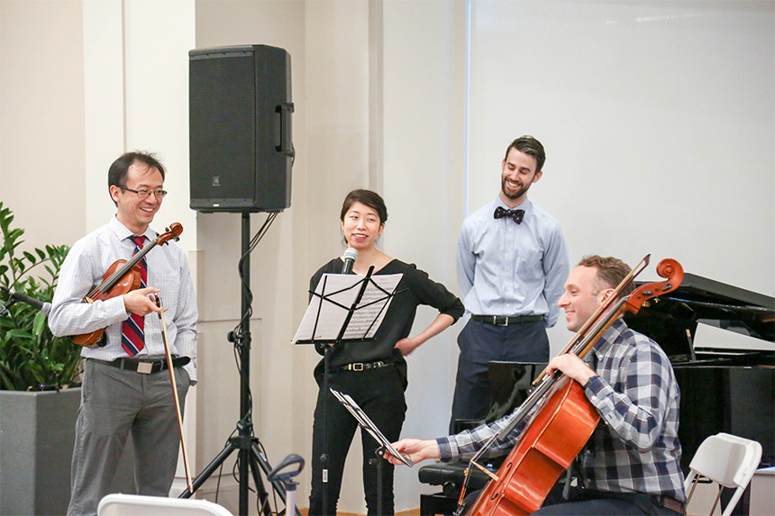 Residents Jack Qian, MD, of the Department of Radiation Oncology, Priscilla Wang, MD, of the Department of Medicine, Mike Foote, MD, of Department of Medicine, and Fritz Stabenau, MD, PhD, of the Department of Medicine, perform Piano Trio No. 2 in C major, second movement, by Johannes Brahms. 