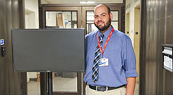 Angel Ayala displays one of the new media carts.