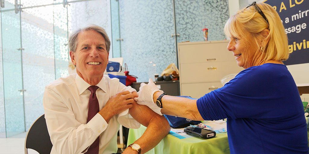 Ron Walls getting a flu shot